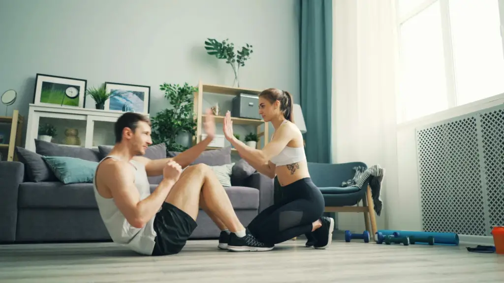 woman-and-man-working-out-at-home