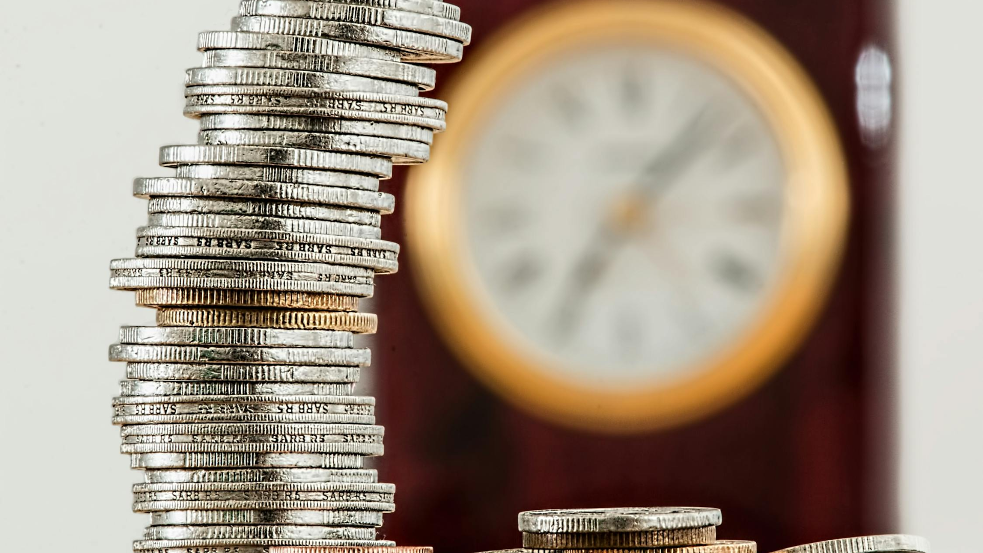 selective-focus-photo-of-stacked-coins